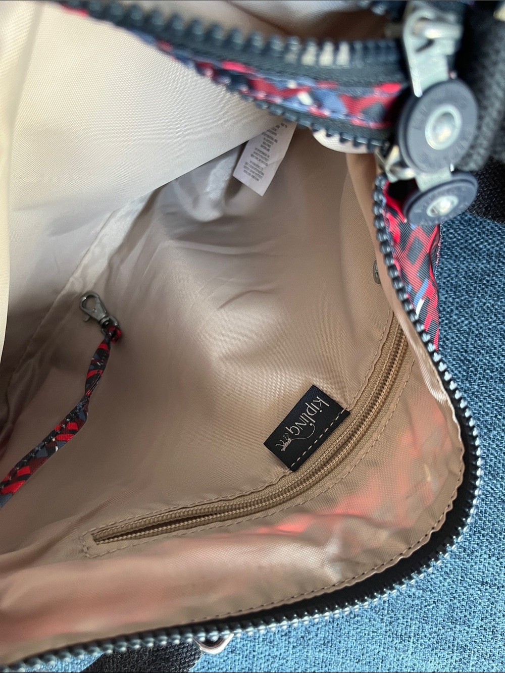 Kipling Spacious many pockets! Red and Black Patterned Triple-Zip Crossbody - Picture 6 of 11